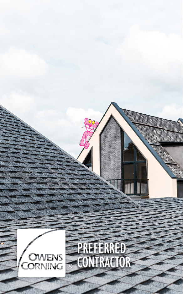 Modern house with gray shingle roofing, Owens Corning Preferred Contractor logo, and a pink panther cartoon on the roof in the background.